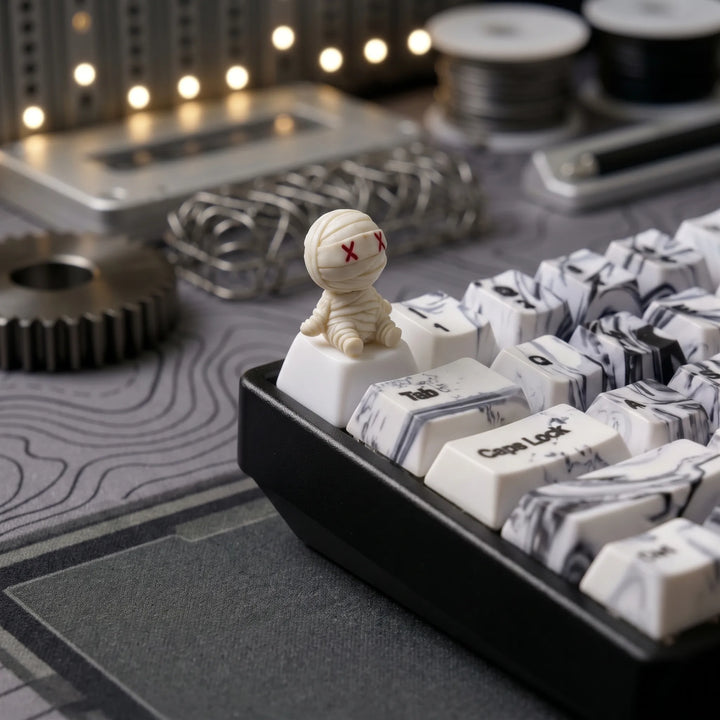 Halloween X-Eye Mummy artisan keycap on a dark gothic custom keyboard